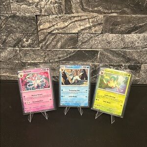 Pokemon Set of 3 Black Star Cosmos Holo cards from Prismatic Evolutions M/NM